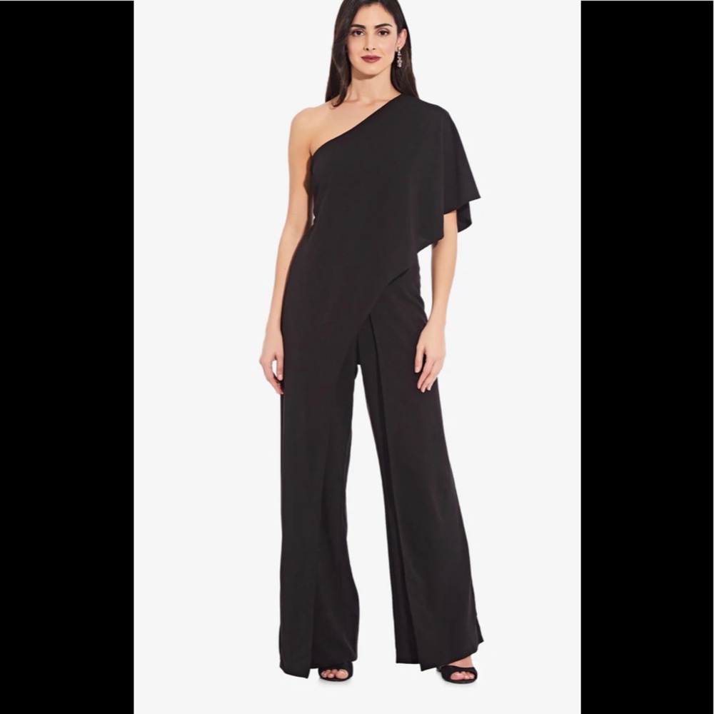 FLUTTER ONE SHOULDER JUMPSUIT IN BLACK